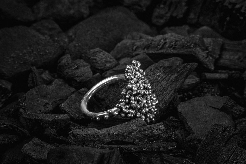 Silver ring with droplets